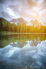 italy dolomites natural park south tyrol region Antorno Carezza Misurina and Braies Lakes Tre Cime mountains clouds sunlight day and sunset photos with colors