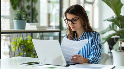 The woman reviewing documents