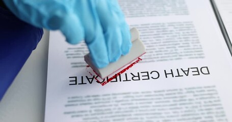 Court medical expert stamping covid-19 on death certificate closeup 4k movie slow motion. Mortality and lethality from coronavirus infection concept