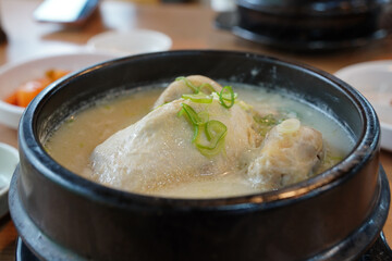 Samgyetang is a Korean dish made by cutting a chicken in half and boiling it with ingredients such as ginseng, jujube, ginger, and garlic. It is a representative health food of summer