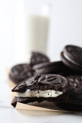 Many tasty sandwich cookies on table, closeup