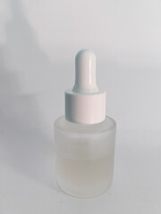 bottle of perfume on isolated white