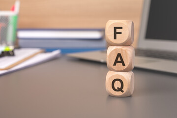 FAQ alphabet letters on 3d wooden blocks