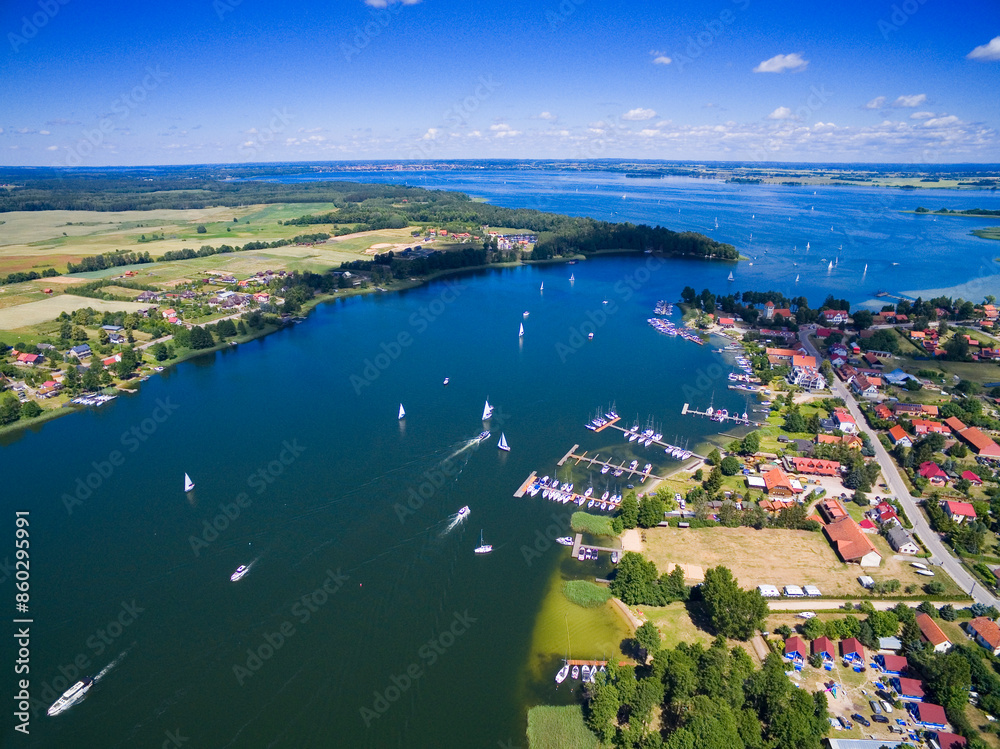 Wall mural aerial view of rydzewo village on the shore of boczne lake, masuria, poland