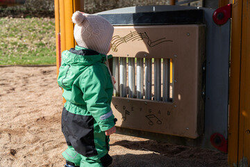 Hanging chimes on a playground, a musical instrument, children's sensory development
