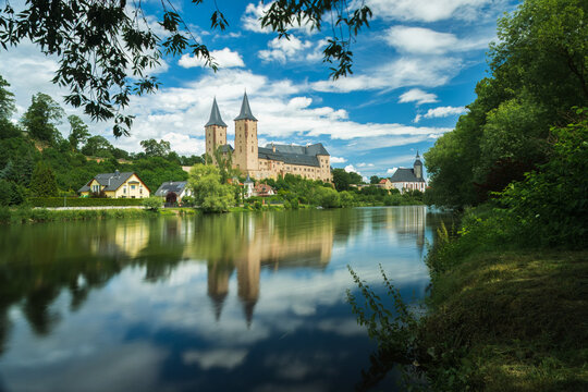 Schloss Rochlitz, Rochlitz Castle is different as it has two towers - most others only one central keep. Both towers where used as a prison and have both a deep dungeon. Reflection in water.