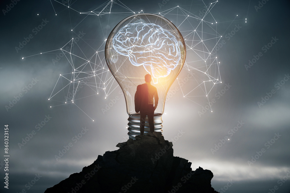 Poster a silhouette inside a light bulb with a brain graphic on a dark, cloudy background, symbolizing inno