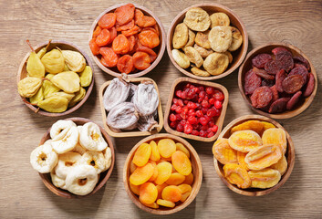 bowls of various dried fruits, top view