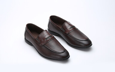 brown loafers moccasins creative theme lifestyle shot on white background 