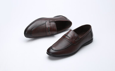 brown loafers moccasins creative theme lifestyle shot on white background 