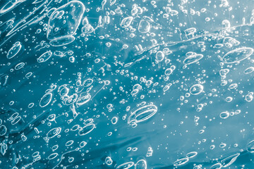 air bubbles in water. dark space background