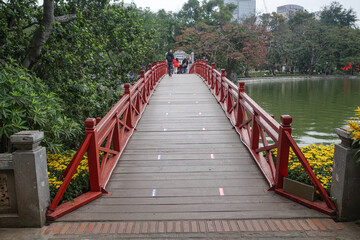 Hanoi, Vietnam - 9 Feb, 2024: Bridge to Ngoc Son Temple on an islet in Hoan Kiem Lake, Hanoi, Vietnam