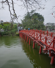 Hanoi, Vietnam - 9 Feb, 2024: Bridge to Ngoc Son Temple on an islet in Hoan Kiem Lake, Hanoi, Vietnam