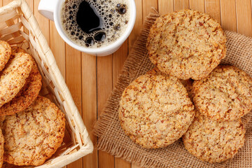 Homemade peanut butter cookies baked on wooden breakfast table