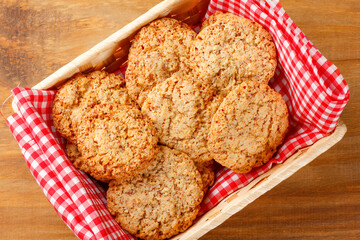 Homemade peanut butter cookies baked on wooden breakfast table