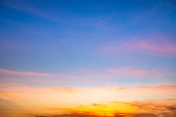 Beautiful , luxury soft gradient orange gold clouds and sunlight on the blue sky perfect for the background, take in everning,Twilight, Large size, high definition landscape photo