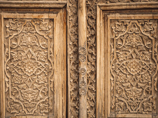 Carved wooden doors, outside Registan Square, in Samarkand, Uzbekistan