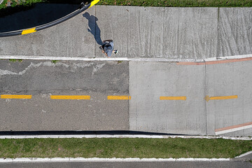 view from above of a young man running 
