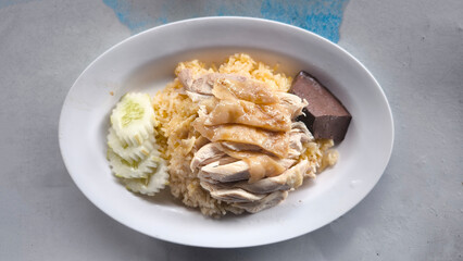 Chicken rice on a plate in a restaurant