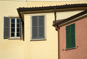houses windows with wooden shutters