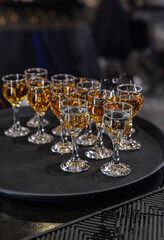 Elegant glasses of amber liquor
