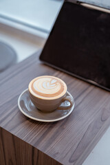 Close-up of coffee cup on table