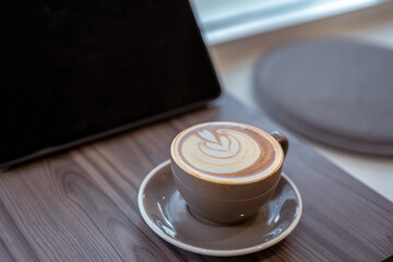 Close-up of coffee cup on table