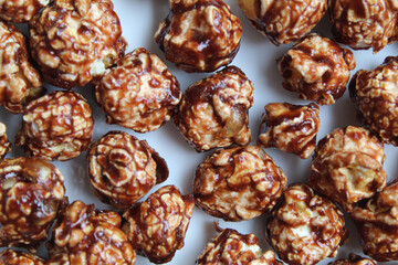 Close up texture of chocolate popcorn, on white background