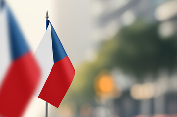 Small flags of Czech Republic on a blurred background