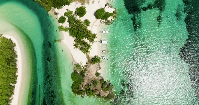 Seascape with tropical sandy beach. Balidbid Lagoon, Bantayan island, Philippines.
