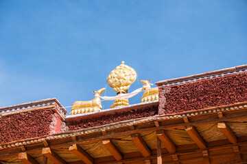 A detailed view of a vibrant tibetan deity painting displayed on a wall, Stongdae Monastery in...