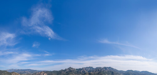 Majestic Mountain Range Under Clear Sky