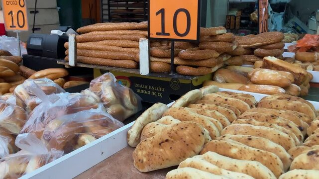 Focaccia, Middle Eastern flatbread, Moroccan or Iraqi bread. Bakery at the Tel Aviv  market, pitas, simit, baguette 