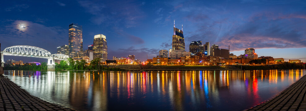 Nashville skyline reflecting in the Cumberland River at twilight