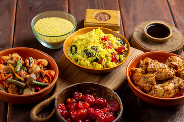 Couscous with dried fruits kritsa in spices and vegetables stewed on the table