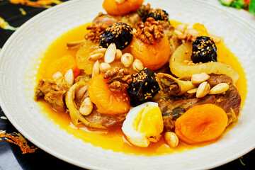 meal with meat and sweet fruit