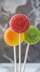 Mutli-colored lollipops made from sugar free sweetener. Smart phone 9:16 aspect ratio.