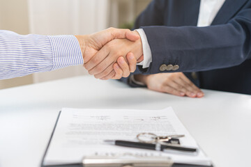 Sell agent, success deal asian young woman handshake or shaking hands with landlord realtor, client male after buyer man signed rental, lease contract. Banker agreement mortgage loan, property lease.