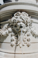 details on a fountain in a park