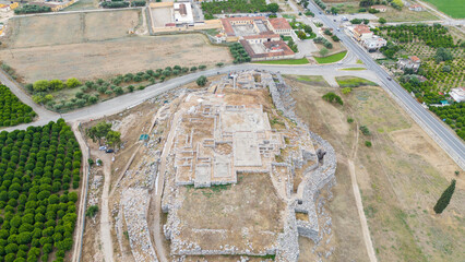 Ruins of ancient acropolis of Tiryns - a Mycenaean archaeological site in Argolis in the Peloponnese, and the location from which mythical hero Heracles performed his 12 labors, Greece.