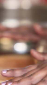 The process of preparing dough for a popular Asian flatbread