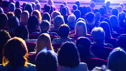 The people enjoying the singer on the stage
