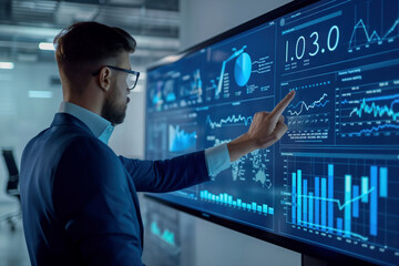 Fototapeta premium Businessman analyzing financial data futuristic digital screen dashboard stock market investment technology analytics real-time