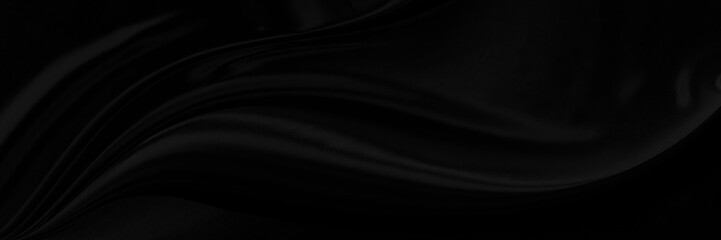 Black gray satin dark fabric texture luxurious shiny that is abstract silk cloth panorama background with patterns soft waves blur beautiful.