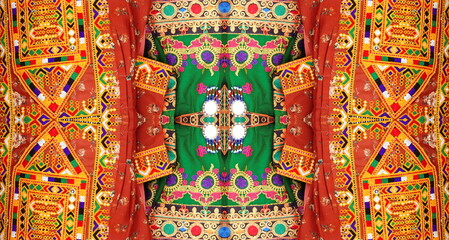 Fototapeta premium Vibrant Mirror Symmetry Traditional Indian Textiles Full Frame