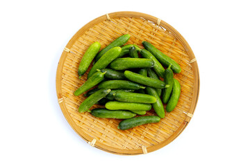 Mini cucumbers on white background.