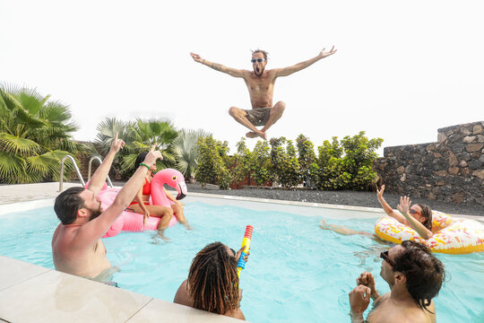 Friends enjoy a playful summer pool day