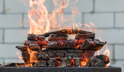 View of a campfire made of stacked logs