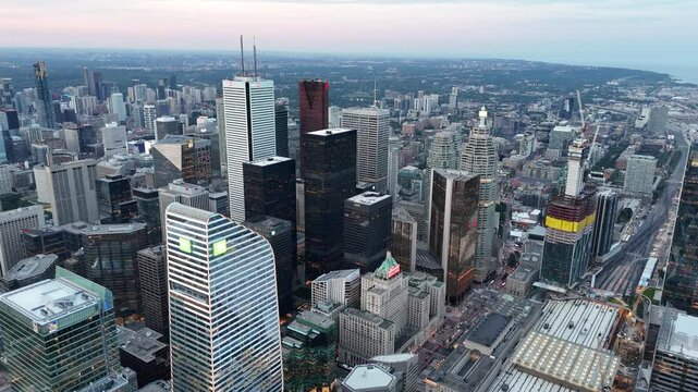 Sunset view of Toronto skyline at night with city light from skyscrapers in the financial district including TD Tower, BMO First Canadian Place, Scotia Tower