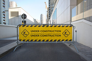 Warning sign under construction